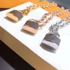 2021 kostenlose Damen Designer Anhänger Halskette Ohrringe Armband Schloss Schmuck Anzug Roségold Silber Modestil Urlaubsgeschenke