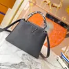 Borsa Capucines BB Mini borsa tote in pelle Taurillon a grana grossa Collezione Macaron Luxury Ladies Snake Print Fashion Flap Crossbody Top Handle