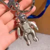 Silver Astronauts Golden keychain for car key women bag pendant decorative charm girls gift luxury brand design metal letter round buckle