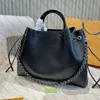 BELLA TOTE sac à bandoulière designer sacs à main femmes perforé seau sacs à cordon M59200 M59369