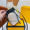 Lyxpåsar Designer Amber Mini Straw Totes Bag Women Woven Beach DrawString Cross Body Travel Shopping Hucket Bag