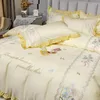 Set di biancheria da letto Fiori di lusso Ricami Princess Ruffles Set Trapunta / Copripiumino in cotone egiziano Federe in lino