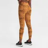 Женские леггинсы напечатанные обнаженные йоги наряды брюки с высокой эластичной беговой фитнес -спортивным спортивным спортивным