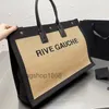 22S Designer Bag Handväska Kvinnor Tote Shoppingväska Väv stor kapacitet Ficka Summer Travel Väskor Män axelväskor Canvas Läder