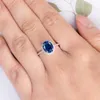 Bijoux de mode Huitan 2018 Classique avec bleu foncé AAA CUBIC Zirconia Pave décortiqué des bagues de fiançailles de mariage pour les femmes AMP G2586827