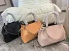 Luksusowe designerskie toty wysokiej jakości skórzane torby perforacyjne Bella Tote Modna torebki dla kobiet torebka z woreczką portfel Kobieta na ramię zakupu 2022