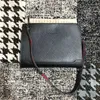 Mode luxurys vrouwen mannen schoudertas echte lederen klinknagels portefeuilles spikes boog crossbody tassen tote ontwerper handtassen redsbottom ontwerpers 2022