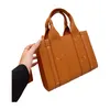 Bolsa de compras feminina Designer Woody Tote Bag Moda Feminina Bolsas de Couro Luxo Bolsas Transversais Preto Marrom Alça Grande Média e Pequena