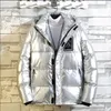 Зимняя новая теплая блестящая куртка водонепроницаемость для мужчин короткая молодежная корейская версия легкая слабая подготавшая хлопок сгущенным теплым капюшоном.