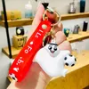Coupe du monde de football mascotte Souvenir voiture porte-clés sac pendentif créatif cadeau exquis