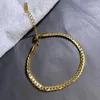 Pulseiras de charme pulseira de ouro torção de aço inoxidável Cadeia cubana para mulheres presentes de jóias gotas de atacado