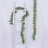 Dekorativa blommor simulering eukalyptus girland växt konstgjorda vinstockar hängande lämnar grönska för bröllop bakgrund väggdekor