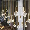 Lampes suspendues en forme d'ampoule en verre moderne lumières créatives cuisine salon décoration salle à manger lampe suspendue LED luminaires en laiton