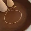 Bedelarmbanden glanzende gedraaide watergolf roestvrijstalen ketens dames bij de hand 18k goud vergulde sieraden voor meisjespaar