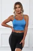 Aangepaste logo yoga -outfit massief wit zwart dunne slinger push omhoog backless naadloze gym fitness tanktops voor dames sport beha