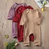 Rompers baby Baby Girl Boy solide jumpsuit lange mouw ritsknopen ribbed pure katoenen ronde nek 220916