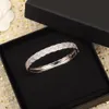 Bracciale rigido a fascia con ciondolo punk di qualità di lusso con diamante scintillante in platino, con timbro su scatola da donna, misura PS7231A