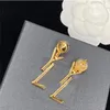 Designer brief hanger y gouden charme oorbellen luxe