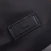 Bolsas escolares mochila hombres bolsos bolso de cuero de vaca de cuero de cuero patrón impreso letras de moda de moda de bolsillo de bolsillo negro mochilas s