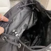 Skolväskor Herr 33 cm Populär Ryggsäck Skolväska Bekväm Slitstark Högkapacitet Dam Nylon Ryggsäckar Rese Duffel Bag Gratis FraktMul