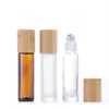 Rouleau de parfum de 10 ml sur la bouteille en verre clair givr￩ givr￩ avec des couvercles de bambou ￠ bambou en m￩tal