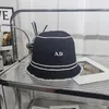 Cappelli lavorati a maglia del nuovo cappello della benna del progettista per i cappucci degli uomini del berretto da baseball di Tophat di modo della lettera di 2 colori delle donne