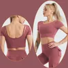 Mode Yoga Fitness Crop Tops Tshirts för kvinnor Gym snabba torra sportar Kort ärm Sexig bakåt inbyggd bröstkudde t-shirts 20W155