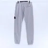 Calça 23sss primavera outono de inverno novo algodão moletom de algodão homem homem bordado bordado crachado hiphop trackpants casuais homens 012508