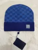 Designer Winter Hot Style Beanie Chapeaux Hommes et Femmes Mode Bonnet Tricoté Laine En Plein Air Chaud Crâne Caps