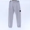 Calça 23sss primavera outono de inverno novo algodão moletom de algodão homem homem bordado bordado crachado hiphop trackpants casuais homens 012508