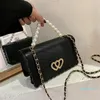 Bolsas de noite Driga Messenger para mulheres Bolsas de ombro de designer de luxo Bolsas de ombro e bolsa com correntes de correntes de pérolas casuais