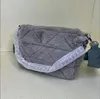 Mulheres 2pcs/conjunto de bolsas de pelúcia designers senta bolsas de ombro único baguetes de couro de hobos com triângulo com letras de triângulo com triângulo