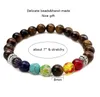 Bracciale con fili di perline occhio di tigre da 8 mm per uomo donna Misura regolabile 7 perline chakra regalo di gioielli con braccialetto intrecciato