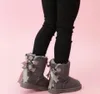 2024 Neue klassische Kinder Schneestiefel australische Kinder Mädchen Bailey 2 Bögen Stiefel echte Leder warme Winterschnee für Kinder Kinder Jungen Baumwollschuhe