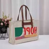 Totes Graffiti Canvas Bag Women Women Vintage Bolsa ombro Brand de designer de luxo Crossbody Feminino Mensagem de compras 220324