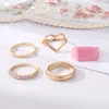 Anello da donna in metallo color oro con cuore e set di anelli in resina con geometria trendy, gioielli bohémien di moda da donna