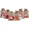 Hediye sargısı Noel keten çantalar çuval bezi goody ile çift jüt çizimstrings Noel baba kardan adam penguen elk şeker takı ambalaj mevcut Noel tercihleri ​​dekorasyon