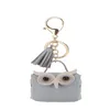 Porte-monnaie de dessin animé mignon PU Owl Design Porte-clés avec pompon Portable Mini Portefeuille Écouteurs Sacs de rangement Mode Porte-clés de voiture Sac Pendentif Gif 2063 E3