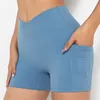 Активные шорты Женщины спортивны йога голые чувства спортзала короткие брюки сексуальное крест -талию бедро отжимание