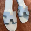 디자이너 Oran Herme Slippers Sandals New X-Class 버전 H 패밀리 슬리퍼 여성 2022 여름 순수 수제 플립 플립 진짜 가죽 착용 평평한 바닥 레저 해변