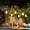 Lampade a sospensione Teste multiple Simulazione Lampadario a ruota con fiori di ciliegio verde per bar ristorante Lampada per apparecchi di illuminazione