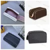 Designer Unisex Leather Toiletry Bag - Portable, Fashionable and Spacious Dopp Kit for Cosmetics, Hangable in Bathrooms and Travel-Friendly - M47528