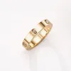 Pierścionki ślubne 2022 Kobiety moda Rose Gold Stanless stalowy pierścień z kamiennym kryształem dla dziewcząt pary para w kropli