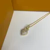 Collar de oro de diseñador para mujeres Diseñadores de lujo Letras de perlas Collares colgantes Joyería de moda