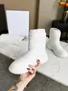 2022 Nieuwe vorst enkel Hoge laarzen wit gewatteerd effect nylon en vacht ￩￩n all-over materialen zwarte witte dubbele kleur