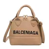 22% OFF Saco 2024 Novo Lançamento Designer Bolsa Estilo Mulheres Quentes Simples Carta Impressão Doce Cor Hand-Heel Exótica Shell