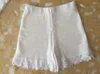 Chándales de mujer, conjunto de 2 piezas de encaje blanco y negro de verano 2022, Top corto de ganchillo Sexy para mujer y pantalones cortos, conjuntos de traje de dos piezas, 2 uds.