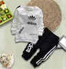 Zestawy odzieży Spring Kid Boy Girl Brand Casual Tracksuit Let Rleeve Letter Płaszcz Ubrania dla niemowląt Spodnie 2 szt.