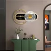 Orologi da parete Orologio in metallo di lusso leggero Personalità moderna e minimalista Moda Soggiorno Decorazione della casa con lampada