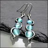 Boucles d'oreilles en forme de vague de pierre de lune bleu solide pour femme